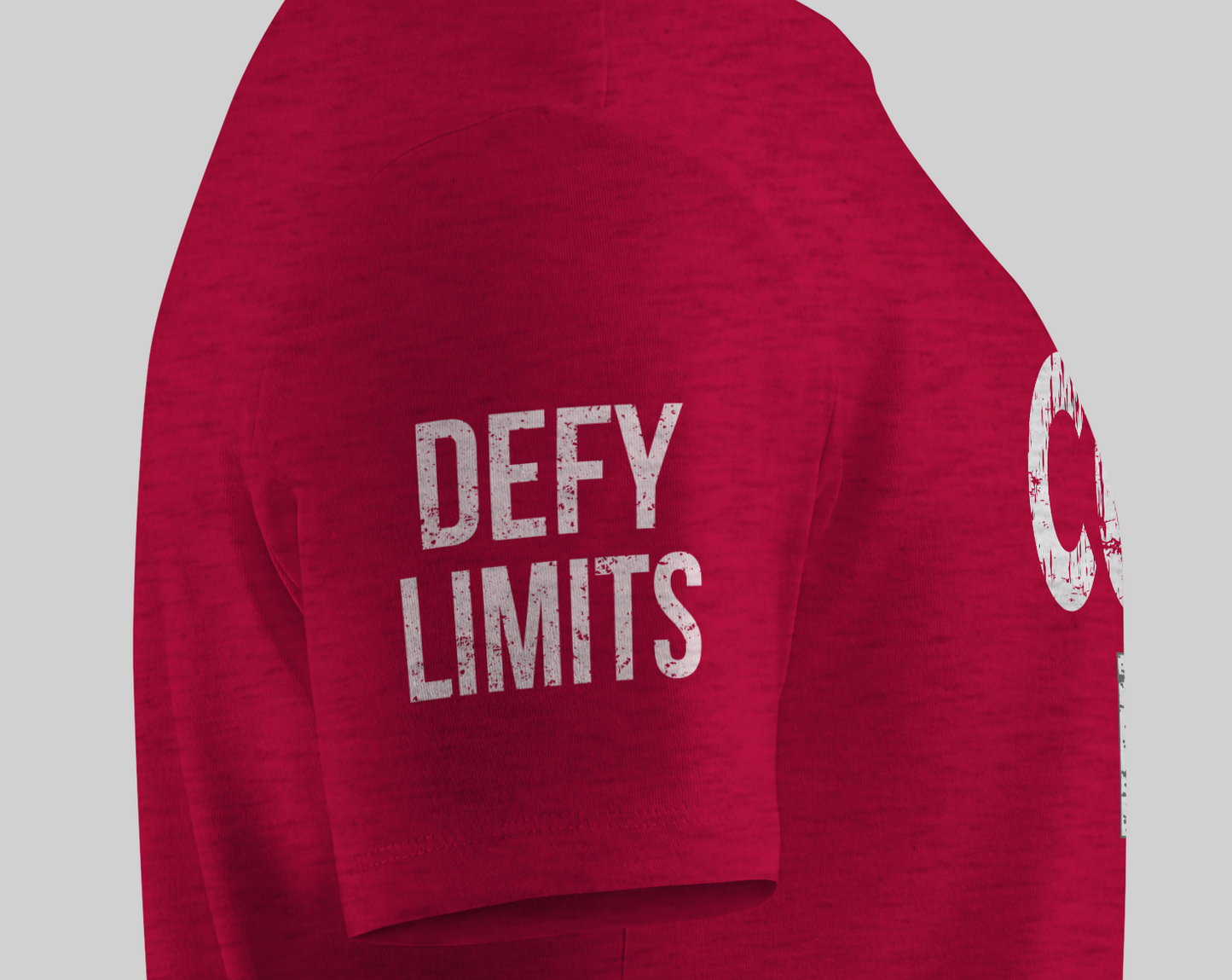 Red shirt with 'DEFY LIMITS' text on a gray background