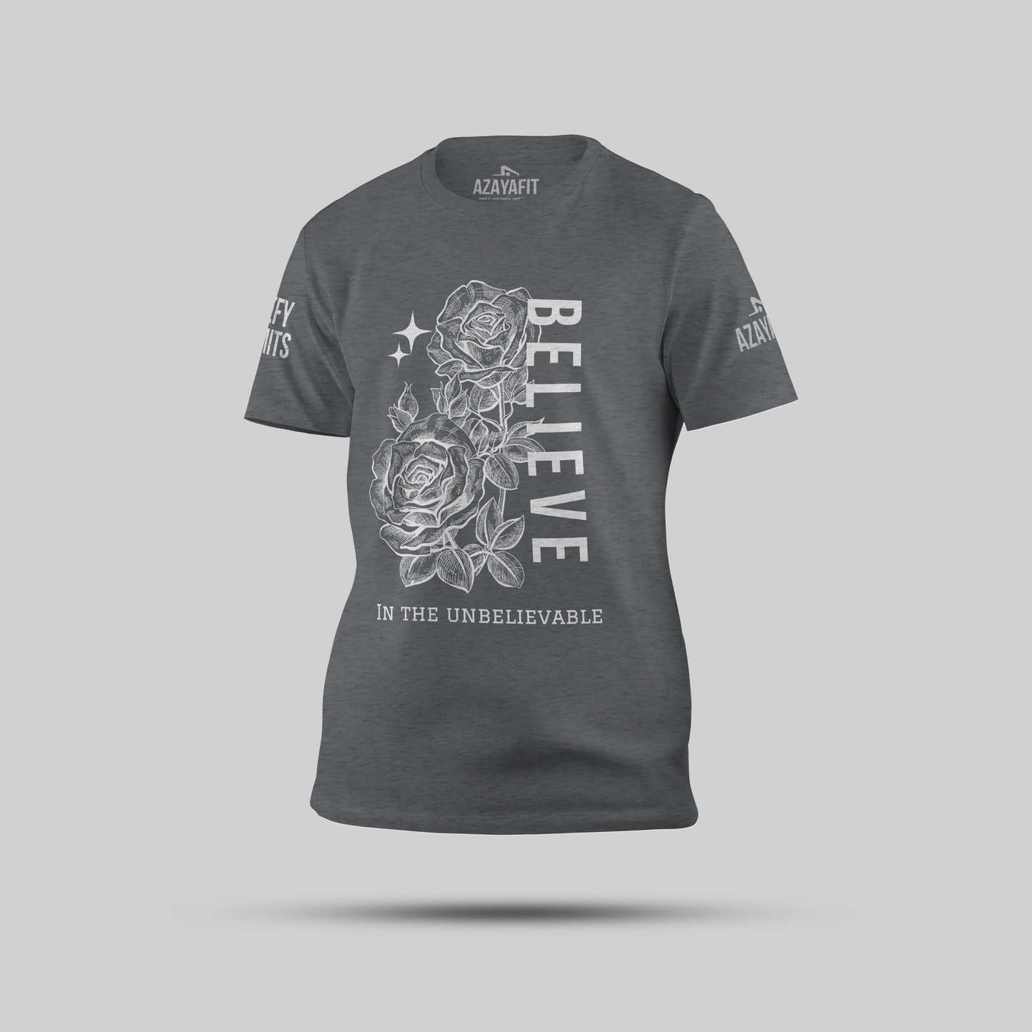 Gray t-shirt with rose design and motivational text on a gray background