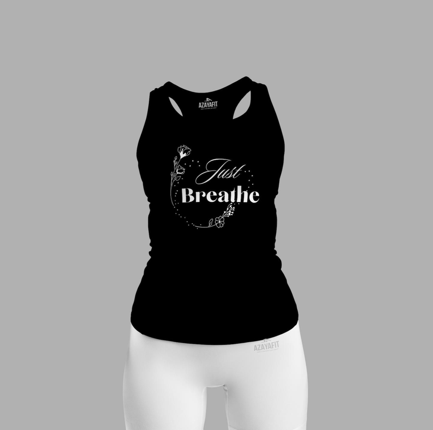Black tank top with 'Just Breathe' text and white shorts on a gray background