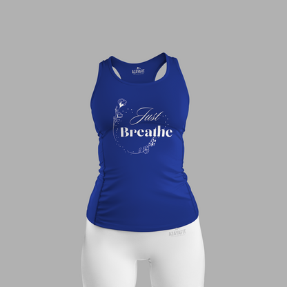 Blue tank top with 'Just Breathe' text and white shorts on a gray background