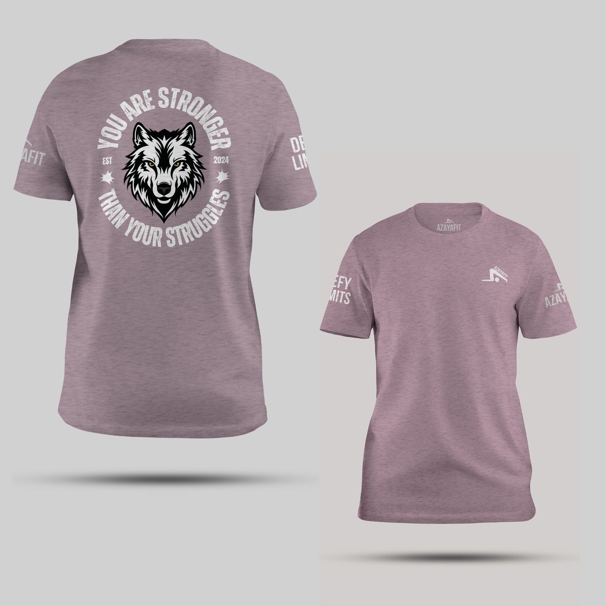 Purple t-shirt with wolf graphic and motivational quote on a light gray background