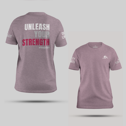 lilac t-shirt with unleash your strength text and branding on a light gray background