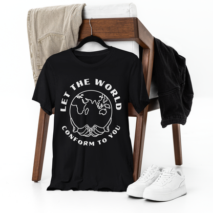 Black T-shirt featuring the "Let the World Conform to You" design draped over a chair, with matching pants casually placed over the backrest. A pair of white shoes rests on the ground beside the chair, all set against a clean white backdrop.