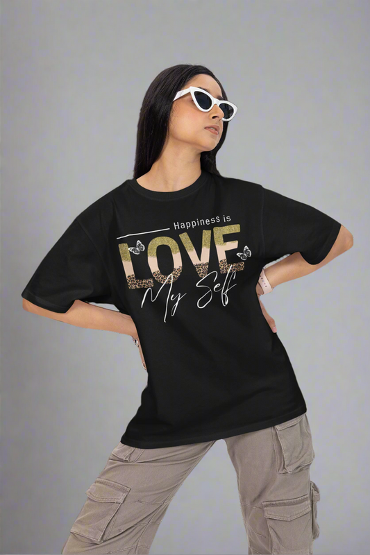 Woman wearing cool glasses and posing with her hands on her waist while wearing a black Love Myself unisex T-shirt. This stylish and comfortable tee promotes self-love and confidence, perfect for everyday wear.