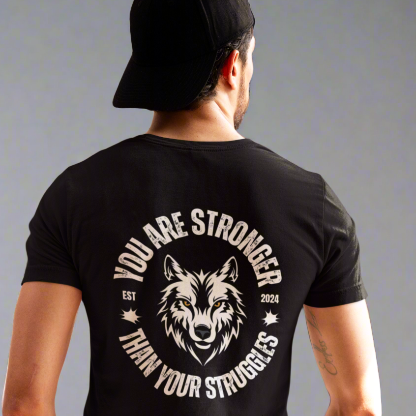 Back view of a man wearing the You Are Stronger T-shirt, showcasing a powerful design that represents strength and resilience.